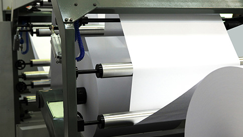 white paper in rolling mill machine
